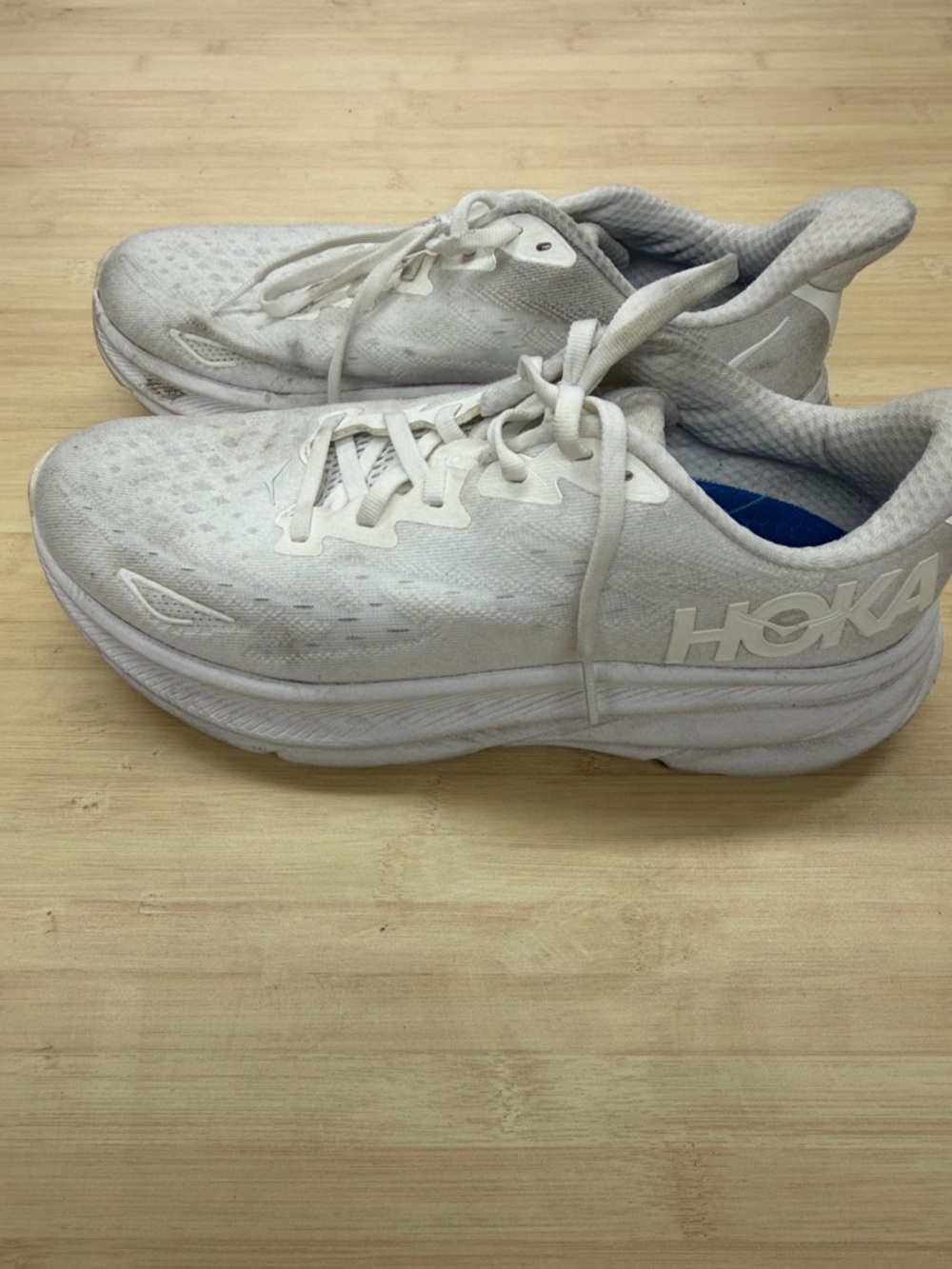 Used dirty white Hoka Clifton 9 athletic shoes women’s 9 B